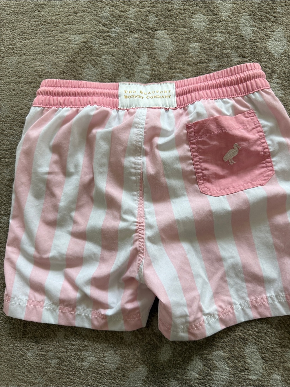 The Beaufort Bonnet Company Pink & White Striped Kids Swim Trunks